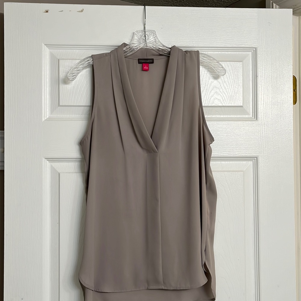 Vince Camuto silky feeling sleeveless tank. Polyester and washable!